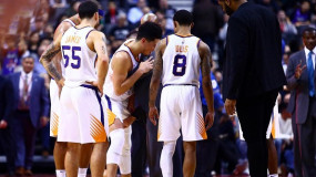 Devin Booker Carried Off the Floor With Non-Contact Injury