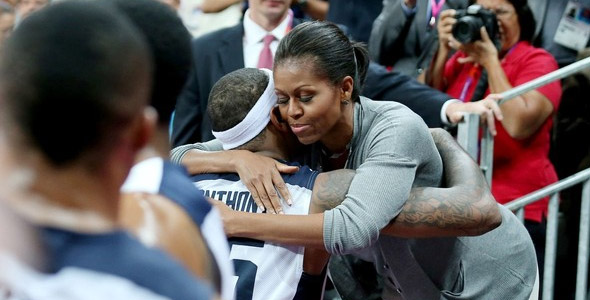 First Lady Michelle Obama Hugs Sweaty Team USA Players After Beating France