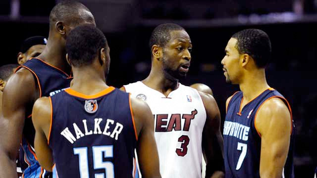 Watch: Dwyane Wade Kicks Ramon Sessions in the Balls