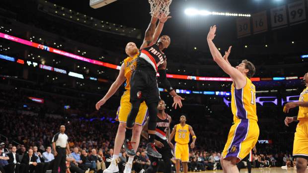 Watch: Damian Lillard Dunks on Chris Kaman